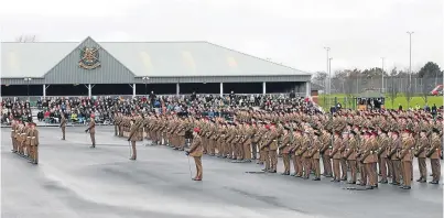  ?? Picture: PA. ?? Junior soldiers march on the parade square during their graduation ceremony at the Army Foundation College, Harrogate, in 2014.