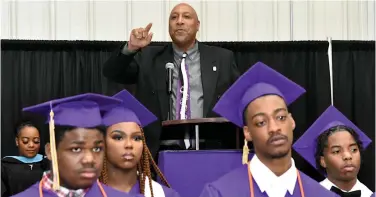  ?? ?? Friendship Aspire Academy Board President Jeff Pulliam asks graduates to face their family members and remember the sacrifices made for them during their educationa­l journey.