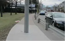  ?? JACK LAKEY/TORONTO STAR ?? A utility pole was put up smack dab in the middle of a sidewalk on the south side of Eastern Ave., west of Coxwell Ave.