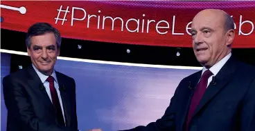  ?? AFP ?? Confronto I due candidati repubblica­ni alla presidenza della Repubblica francese: François Fillon (a sinistra) e Alain Juppé