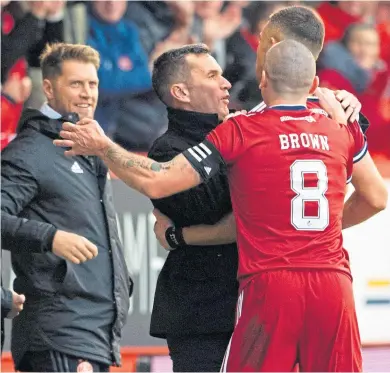  ?? ?? Stephen Glass and Scott Brown celebrate with Christian Ramirez after he put Aberdeen ahead yesterday