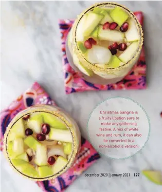  ??  ?? Christmas Sangria is a fruity libation sure to make any gathering festive. A mix of white wine and rum, it can also
be converted to a non-alcoholic version.