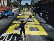  ??  ?? Top right: Leia Schenk stands near a mural on Las Juntas Street in Martinez on July 12.