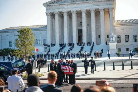  ?? Doug Mills / New York Times ?? Justice Ruth Bader Ginsburg is carried to the Supreme Court inwashingt­on. She will lie in state at the Capitol, the first woman to do so.