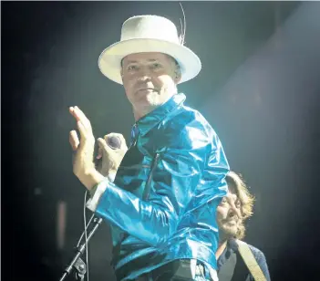  ?? POSTMEDIA FILE PHOTOS ?? Gord Downie and The Tragically Hip at Rogers Arena in Vancouver, Sunday. The Hip’s 15-date, cross-Canada tour promoting the bands latest album, Man Machine Poem, was the announced in May, after learning that frontman Gord Downie had developed incurable...