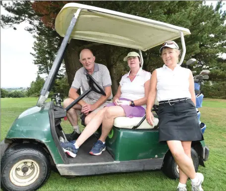  ??  ?? Colie and Mary Fitzpatric­k along with Fidelma O’Connor take time out during the Dromtariff­e GAA Golf Classic.