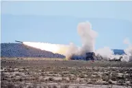  ?? IMAGE COURTESY WHITE SANDS MISSILE RANGE ?? Multiple Launch Rocket System kicks up clouds of dust while firing during a test on White Sands Missile Range in 2015.