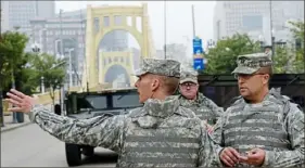  ?? Saul Loeb/AFP via Getty Images ?? National Guard troops man a checkpoint into Downtown Pittsburgh on Sept. 24, 2009, near the site of the G-20 summit.