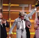  ??  ?? Chance The Rapper accepts the award for best new artist.