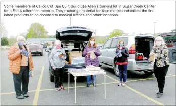  ?? Lynn Atkins/The Weekly Vista ?? Some members of Calico Cut Ups Quilt Guild use Allen’s parking lot in Sugar Creek Center for a Friday afternoon meetup. They exchange material for face masks and collect the finished products to be donated to medical offices and other locations.