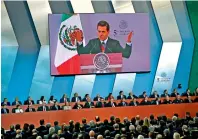  ?? — AFP ?? Enrique Pena Nieto delivers his fifth annual report at the National Palace in Mexico City on Saturday.
