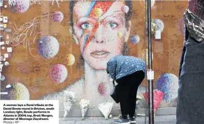  ?? Moonage Daydream. Photos / AP ?? A woman lays a floral tribute at the David Bowie mural in Brixton, south London; right, Bowie performs in Atlanta in 2004; top, Brett Morgen, director of