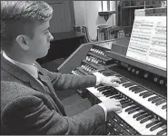  ??  ?? Organist Rees Roberts performs Tuesday at North Little Rock’s St. Luke’s Episcopal Church.