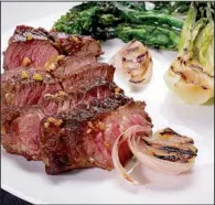  ?? The Washington Post/DEB LINDSEY ?? Teriyaki-Glazed Steak With Broccoli Rabe