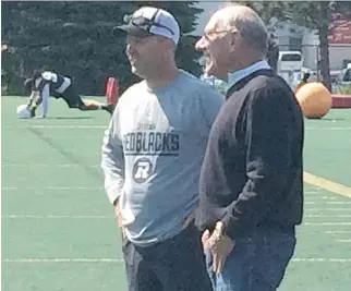  ?? GORD HOLDER/OTTAWA CITIZEN ?? Russ Jackson with Redblacks coach Rick Campbell at practice on Wednesday.