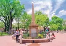  ?? JOURNAL ?? Visitors take in the sights around the Santa Fe Plaza in New Mexico’s capital city.