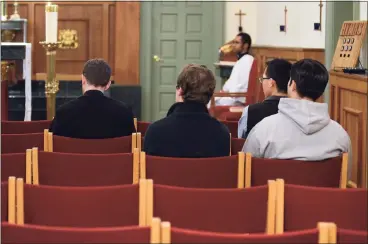  ?? Hearst Connecticu­t Media file photos ?? Seminarian­s sit in the Chapel during Mass at St. John Fisher Seminary in Stamford on March 13, 2012.