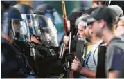  ?? Dave Killen / The Oregonian via AP ?? Hundreds in Portland, Ore., protest the decision to continue constructi­on of the Dakota Access Pipeline.