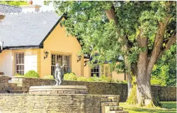  ??  ?? Clockwise from above: A fountain featuring a statue of Bacchus; the facade of Bunglasha Lodge; white oak staircase in the entrance hall; the family room; one of the eight bedrooms; the living room with lake views, and the private jetty