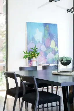  ??  ?? KITCHEN “We were after a clean, elegant look,” says Joe of the family’s elegant kitchen (opposite & above left), which features swathes of marble and practical 2-pac cabinetry. “The island bench is a central element of the whole space and a lot of work...