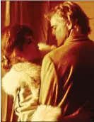  ??  ?? EDUCATIONA­L: Maria Schneider and Marlon Brando in Last Tango In Paris