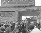  ?? IMAGES ESN/AFP VIA GETTY ?? Families rally at an education ministry building in Tehran amid a wave of suspected poisonings of schoolgirl­s. The incidents began in November and have escalated, prompting protests by teachers on Tuesday.