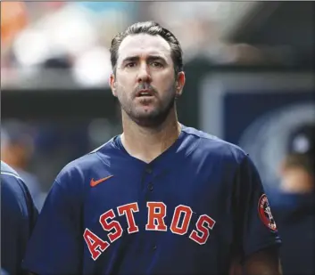  ?? AP Photo/Julio Cort ez ?? Houston Astros pitcher Justin Verlander walks in the dugout after pitching to the St. Louis Cardinals in the first inning of a spring training baseball game, on on March 3 in Jupiter, Fla.