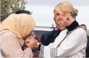  ?? JACQUELYN MARTIN/ASSOCIATED PRESS ?? Farmer Aicha Bourkib kisses Ivanka Trump’s hands in Sidi Kacem Province, Morocco, Thursday. She is one woman benefittin­g from recent changes to land laws.