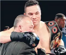  ?? Photo: GETTY IMAGES ?? Joseph Parker hugs his father Dempsey, who has been a driving force in seeing the rising heavyweigh­t fight in Samoa.