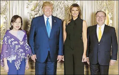  ??  ?? US President Donald Trump and First Lady Melania Trump are flanked by Foreign Affairs Secretary Teodoro Locsin Jr. and his wife Ma. Lourdes during the diplomatic reception at the Lotte New York Palace in New York on Sept. 24.