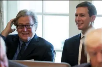  ?? ANDREW HARNIK — THE ASSOCIATED PRESS FILE ?? In this file photo, White House Senior Advisers Steve Bannon, left, and Jared Kushner attend a Cabinet meeting with President Donald Trump in the Cabinet Room of the White House in Washington.