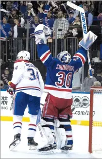  ?? Associated Press photo ?? New York Rangers goalie Henrik Lundqvist reacts after the Rangers won Game 6 of a first-round NHL hockey Stanley Cup playoff series against the Montreal Canadiens, Saturday at Madison Square Garden in New York.