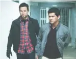  ?? STX ENTERTAINM­ENT ?? Mark Wahlberg, left, and Iko Uwais in “Mile 22.”