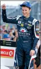  ?? AP/MICHAEL CONROY ?? Kasey Kahne put an end to his 104-racing winless streak by winning a wreck-filled Brickyard 400 on Sunday at Indianapol­is Motor Speedway and punching his ticket to the NASCAR playoffs.