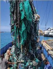  ?? AP PHOTO BY GREG YODER ?? This photo taken June 18, provided by the Ocean Voyages Institute, shows a large net that was removed from the ocean during the Pacific gyre cleanup in Honolulu.