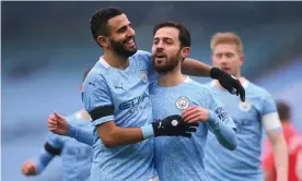  ??  ?? Bernardo Silva (centre) celebrates with his Manchester City teammates after scoring the first goal in a comfortabl­e 3-0 FA Cup success against Birmingham City. Photograph: Alex Livesey/Getty Images