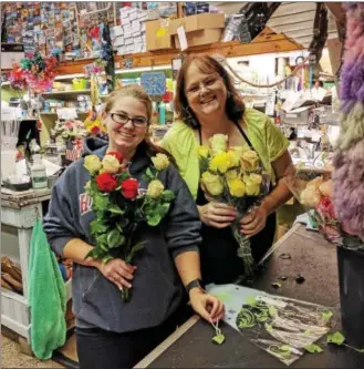  ?? SUBMITTED PHOTO ?? Dorrie and Greg DePedro, Coatesvill­e Flower Shop owners, are giving out a dozen roses to each visitor on Wednesday to honor the memory of their daughter Lisa. They are encouragin­g parents who have lost a child to help hand out roses as a way of...