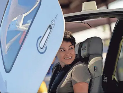  ?? MATT YORK/AP ?? United Aviate Academy student pilot Ashley Montano inspects her aircraft prior to a flight in Goodyear, Ariz., last year. Montano hopes that in a few years she will be flying airline jets.