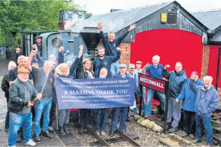  ?? GLEN CLARKSON ?? Trustees and members of the West Lancashire Light Railway Trust, Hesketh Bank, celebrate the purchase of the land on which the railway runs