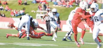  ?? UCONN/COURTESY ?? UConn running back Robert Burns heads downfield during first-half action in the Huskies’ game at Ball State on Saturday in Muncie, Indiana.