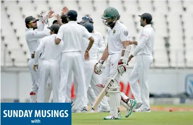  ??  ?? South African batsman Hashim Hamla leaves the pitch after being caught by Sri Lanka wicket keeper Dinesh Chandimal during the third Test at Wanderers Cricket Stadium in Johannesbu­rg - AFP