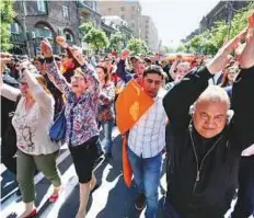  ?? Reuters ?? Supporters of opposition leader Nikol Pashinyan rally in Yerevan, Armenia, after talks to discuss a transition were scrapped.