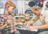  ?? ?? ROOM TO GROW: The brothers credit their dad, Rance (pictured with Ron, left, and Clint in 1964), who was an actor in his own right, with helping them craft successful careers.