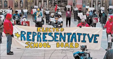  ?? BRIAN CASSELLA/CHICAGO TRIBUNE ?? Moises Moreno speaks Jan. 5 during a demonstrat­ion at the Thompson Center for a bill for an elected board of education for Chicago Public Schools.