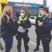  ?? Picture: FACEBOOK ?? Police speak with an anti-masker outside a Melbourne Bunnings store at the weekend.