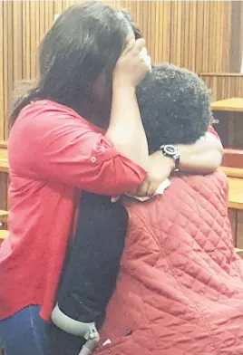  ?? Picture: Ilse de Lange. ?? GUILTY. A weeping Thobile Mbatha hugs her mother after being convicted of the premeditat­ed murder of her 10-month-old son and attempted murder of her three-year-old son.