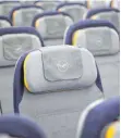  ?? FOTO: AFP ?? Sitzreihen eines Lufthansa Airbus A340: Unzählige Kunden warten wegen annulliert­er Flüge noch immer auf ihr Geld.