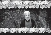  ?? AP/EBRAHIM NOROOZI ?? Iran’s President Hassan Rouhani speaks Saturday in Tehran after he was sworn in for a second term in office.
