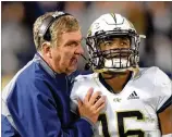  ?? HYOSUB SHIN / HSHIN@AJC.COM ?? It may be the final game of the triple-option era at Georgia Tech, but don’t expect Paul Johnson (left) to turn senior QB TaQuon Marshall loose in Wednesday’s bowl.