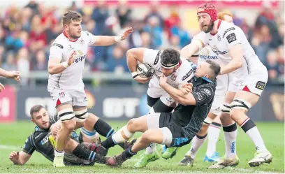  ?? Photograph: Press Eye ?? Glasgow’s Simone Favaro tackles Marcell Coetzee of Ulster